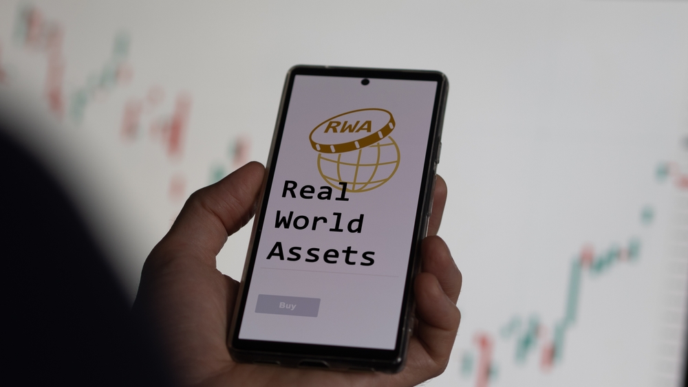 an investor analyzing an fictional RWA ETF on a screen, investing in real world assets on a phone