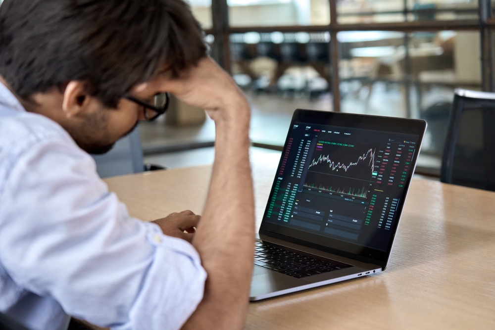 Stressed business man crypto trader broker investor analyzing