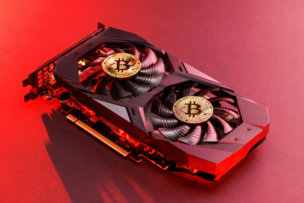 Two gold bitcoin on a video Card with red backlight in the style of cyberpunk.