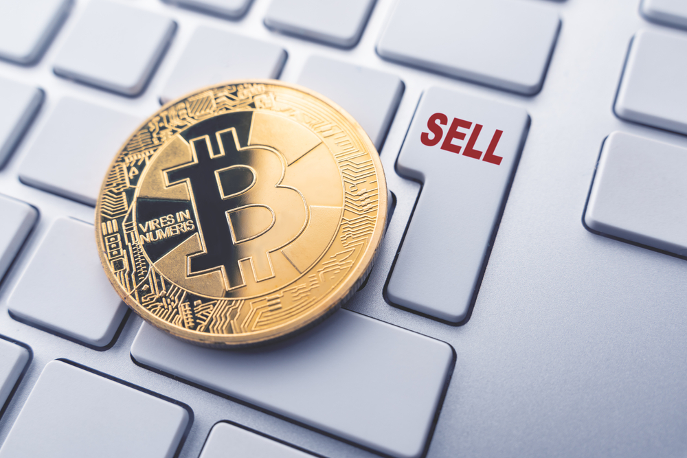 Bitcoin sell concept. Toned soft focus picture. 