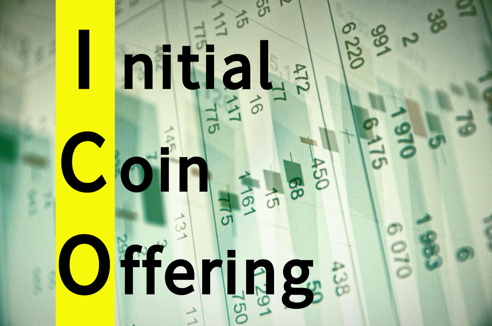 Text Initial coin offering, financial data visible on the background.