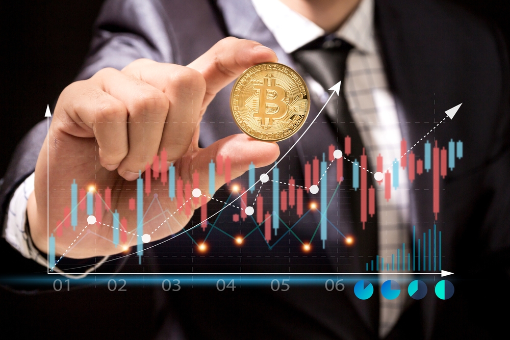 Successful of trader investor businessman holding bitcoin