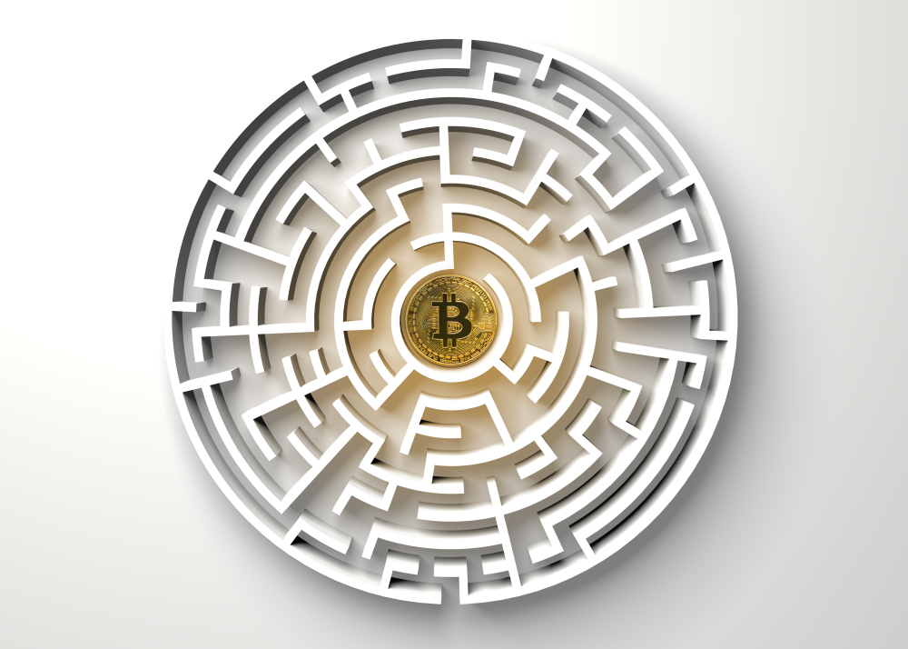 bitcoin in the central point of maze view from above.