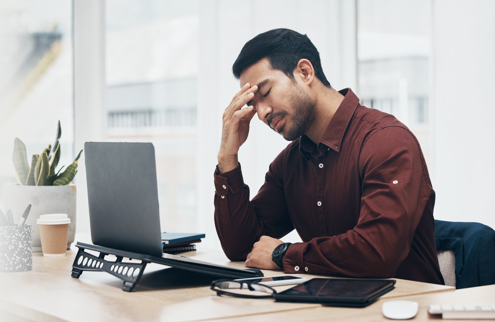 Laptop error, headache or man stress over financial crypto crisis