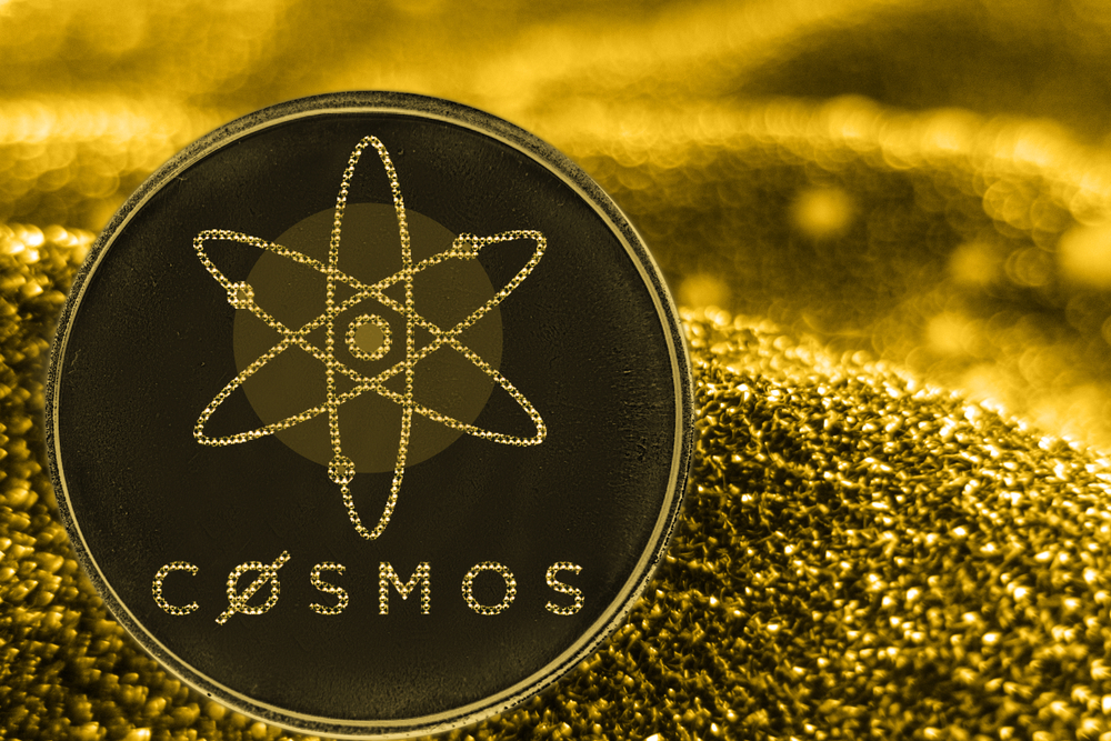 Coin cryptocurrency cosmos and gold fabric background. atom logo.