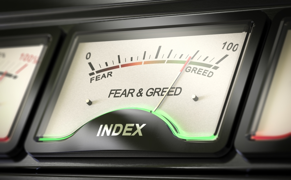 Close up on a conceptual gauge. Investor sentiment, fear and greed index concept. 3d render.