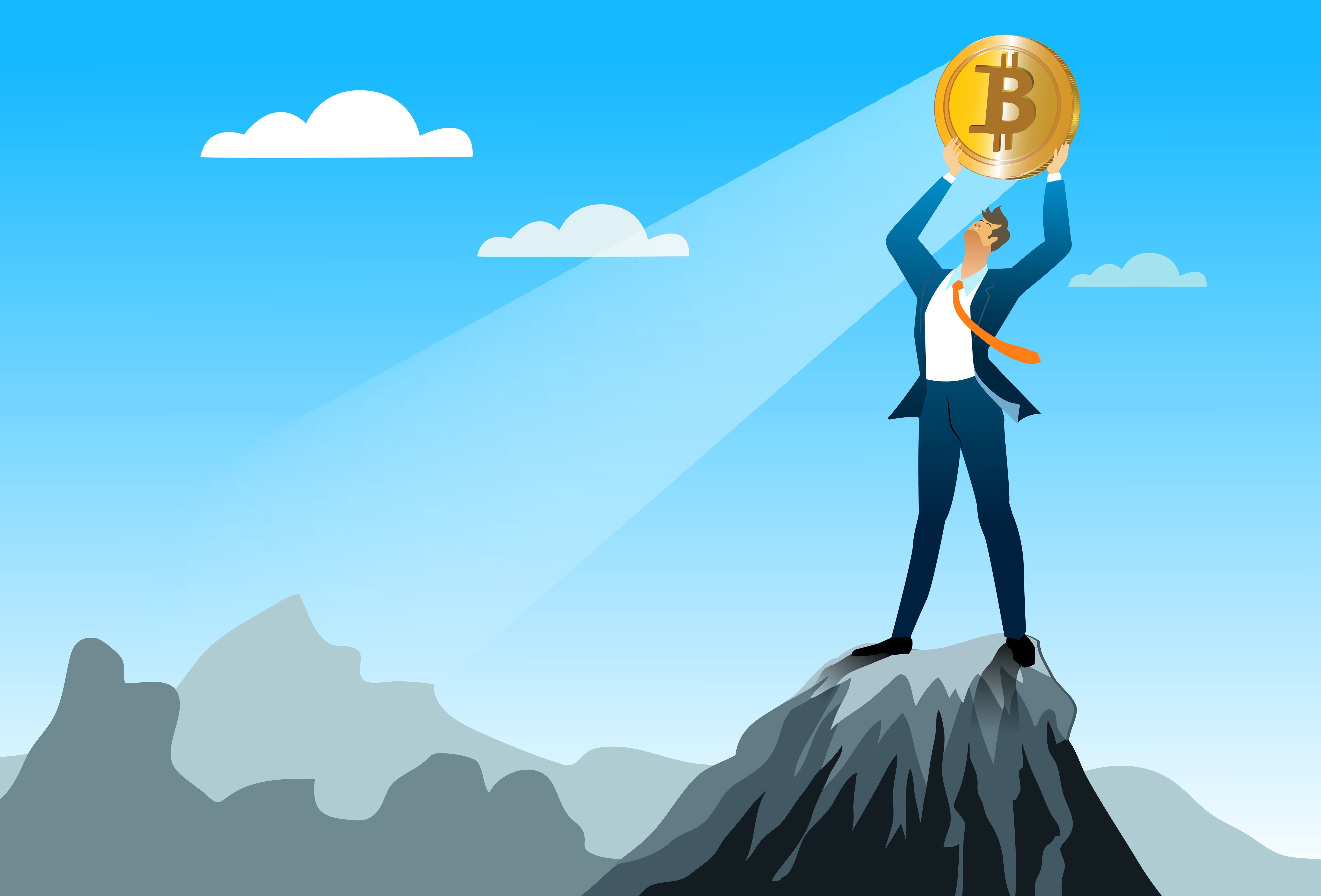 Bitcoin business - Businessman holding bitcoin on top of mountain.