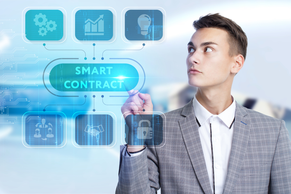 Young businessman working on a virtual screen of the future and sees the inscription