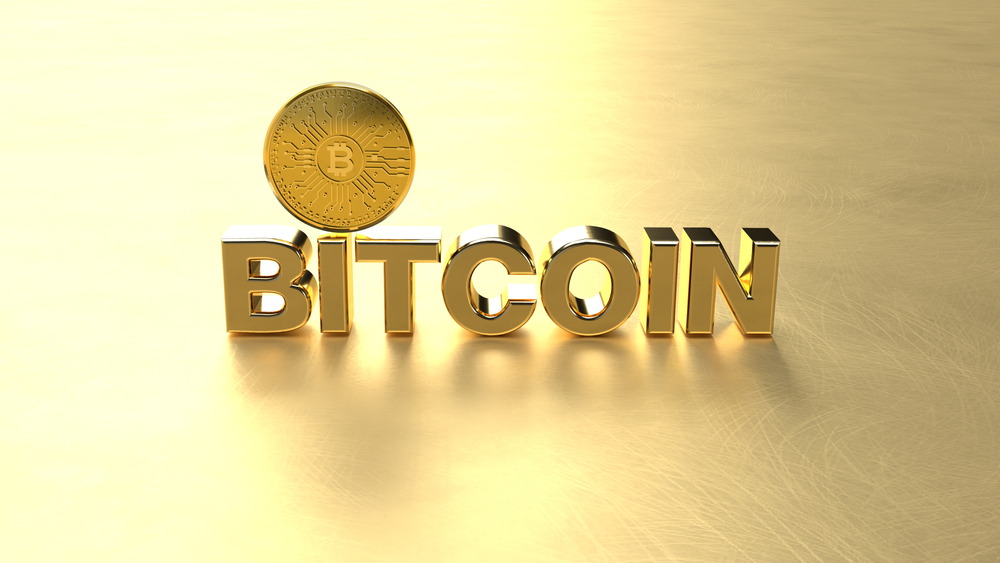 Bitcoin gold coin gold block dark background