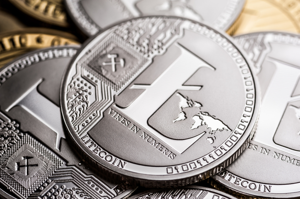 Group of silver litecoin coins, close-up. Cryptocurrency concept, e-banking.