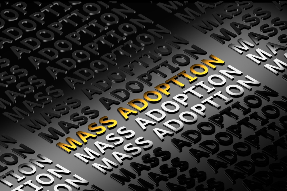 Words "Mass Adoption" written in bold letters in repetative manner.