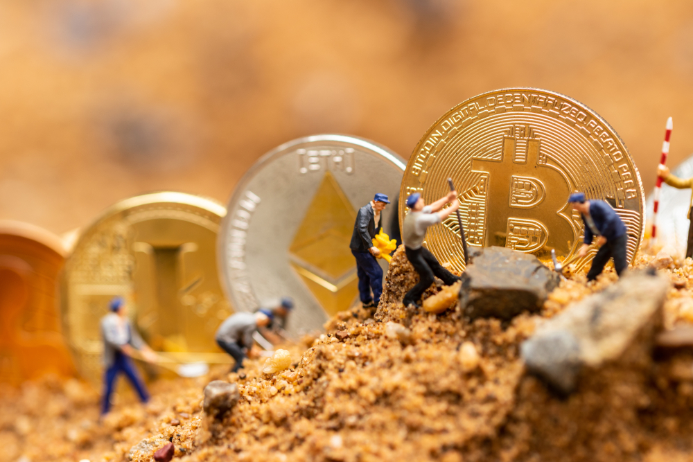 little miner is digging for bitcoin . conceptual image for bitcoin mining and discovery crypto currency. , financial concept