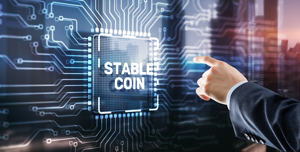 Man clicks on the inscription: Stable Coin. Stablecoins Cryptocurrencies Stable Market Price Value Coin Currency