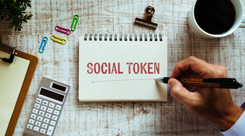 A notebook with the word Social Token.