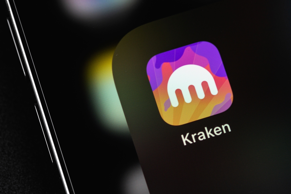 Kraken mobile icon app on a screen smartphone closeup.