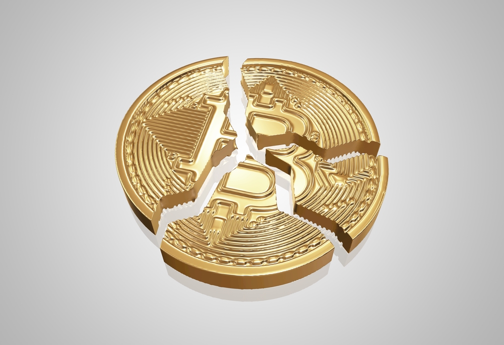 Broken bitcoin on white background. 3d rendering image.